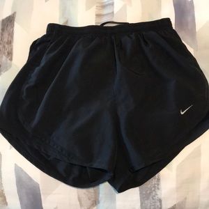 All Black Nike running shorts